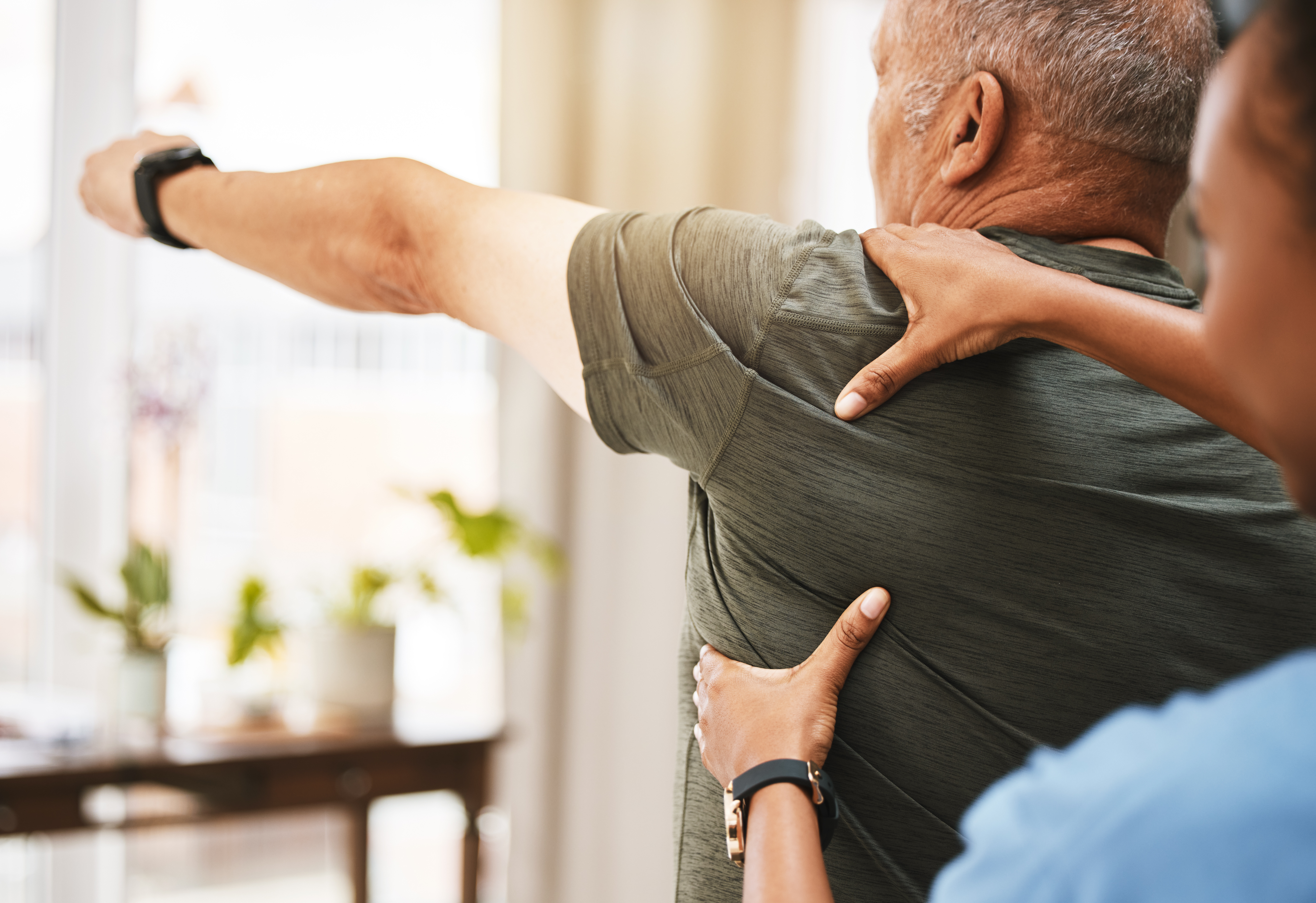 shoulder pain physiotherapist woman and senior ma 2023 01 13 00 03 50 utc